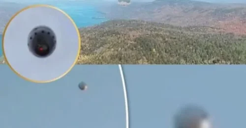The day Google Earth stood still: UFO hunters panic as a glowing orb appears above a US lake on Street View.