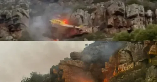 Pánico en helicóptero! Momento de horror: un helicóptero de extinción de incendios se estrella contra un incendio forestal en la montaña tras rozar un acantilado y precipitarse entre las llamas.