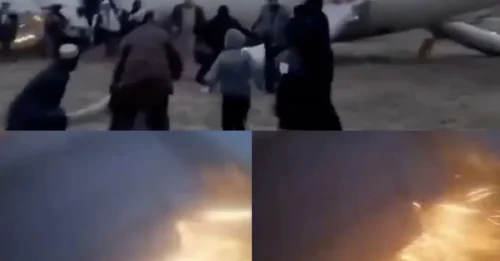 TERROR DE VUELO! Momento impactante en el que saltan chispas del avión tras salirse de la pista mientras los aterrorizados pasajeros son evacuados por los toboganes de emergencia.