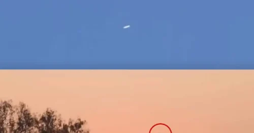 MYSTERY IN THE SKY! Cigar-Shaped Object Caught Hovering Over Kansas — UFO Report Video Leaves Viewers Divided